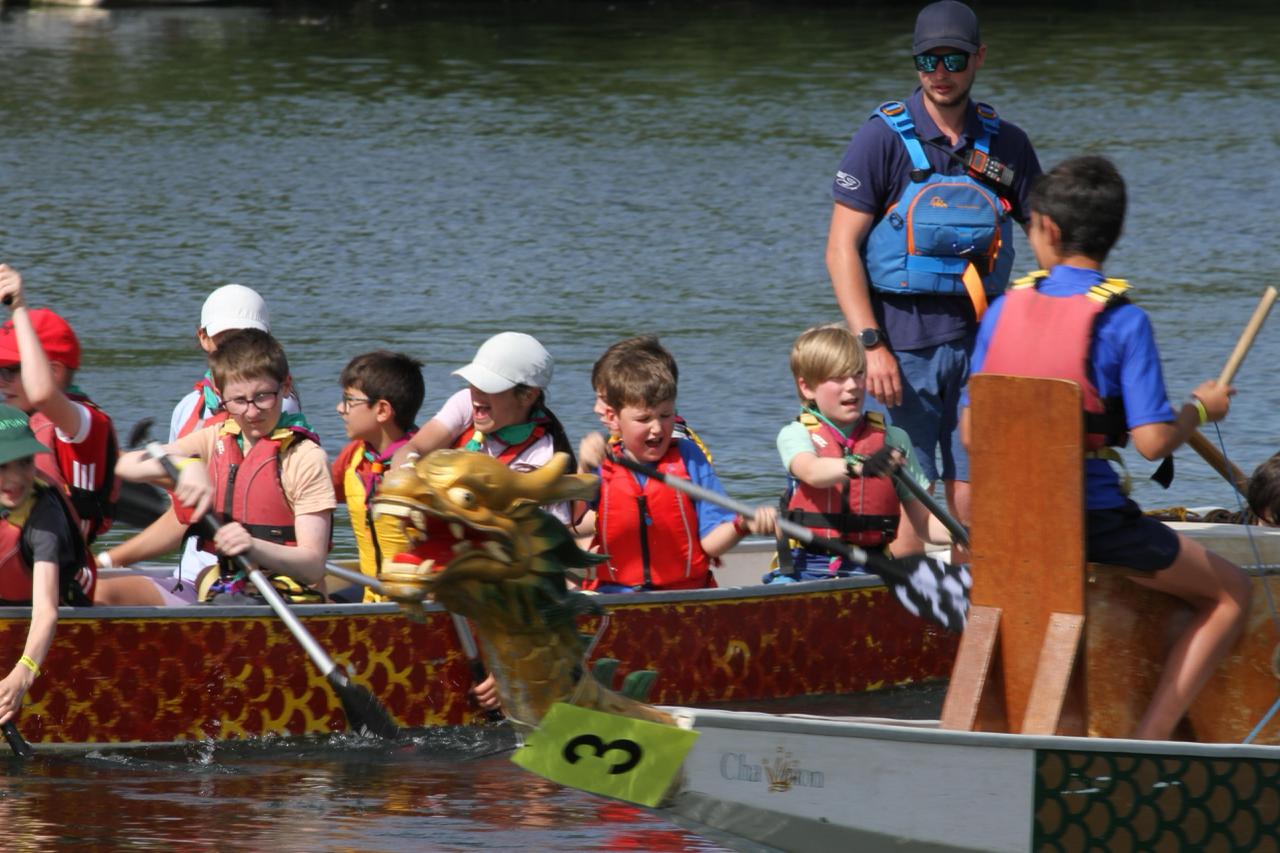 1st Warfield young people paddling a dragon boat